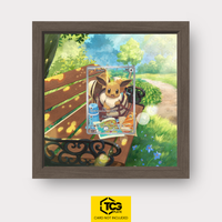 Eevee DLR 114 Frames® in Chocolate Oak with UV-protective case and magnetic wall mount by TCGplate.
